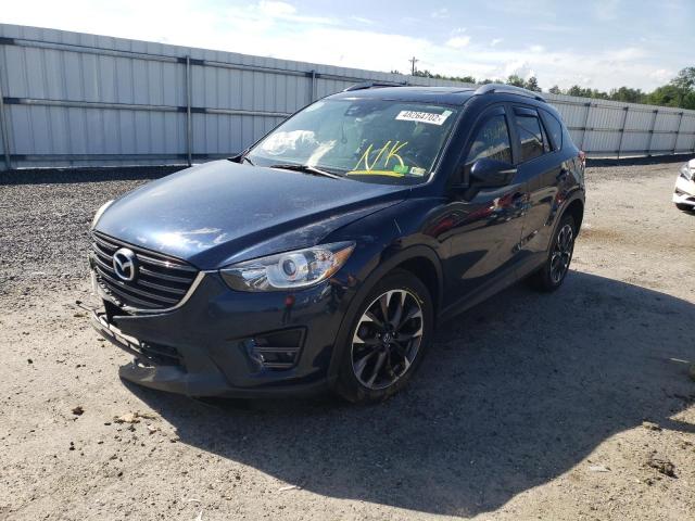 Photo 2 from auction – 2016 MAZDA CX-5 GT with VIN JM3KE4DY4G0810265