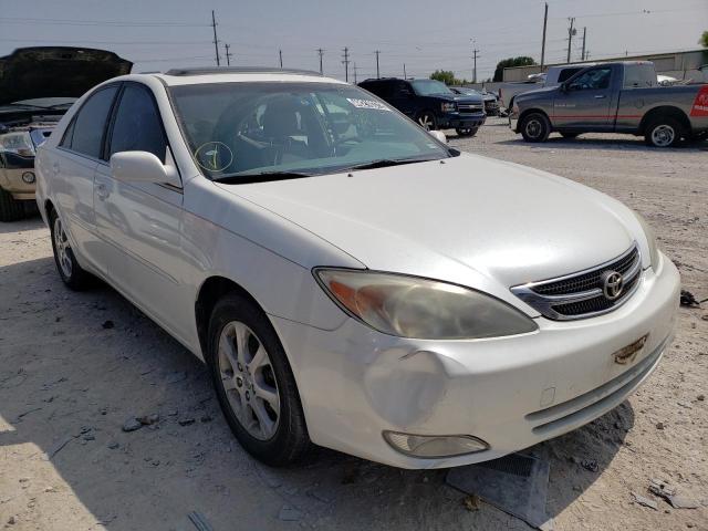 TOYOTA CAMRY LE 2004 with VIN JTDBE32K640284654 - Photo from auction
