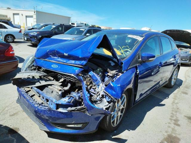 Photo 2 from auction – 2015 FORD FOCUS SE with VIN 1FADP3K22FL358520