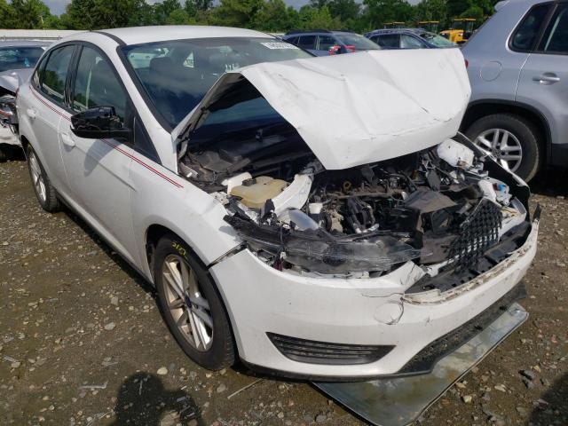 FORD FOCUS SE 2016 with VIN 1FADP3F22GL374941 - Photo from auction