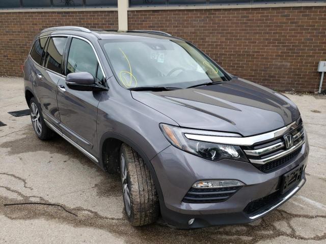 HONDA PILOT ELIT 2016 with VIN 5FNYF6H04GB038657 - Photo from auction