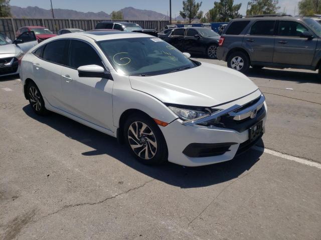 HONDA CIVIC EX 2018 with VIN 19XFC2F70JE019951 - Photo from auction
