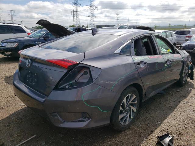 Photo 4 from auction – 2018 HONDA CIVIC EX with VIN 19XFC2F7XJE035137