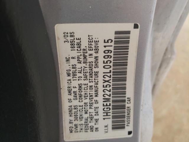 Photo 10 from auction – 2002 HONDA CIVIC LX with VIN 1HGEM225X2L059915