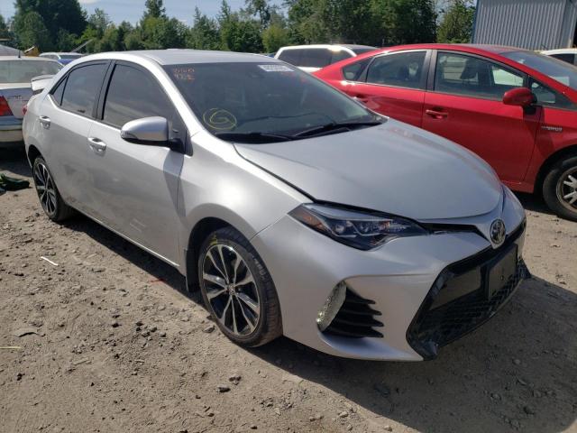 TOYOTA COROLLA L 2018 with VIN 2T1BURHE8JC990890 - Photo from auction