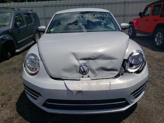 Photo 9 from auction – 2017 VOLKSWAGEN BEETLE SE with VIN 3VWJ17AT0HM604253