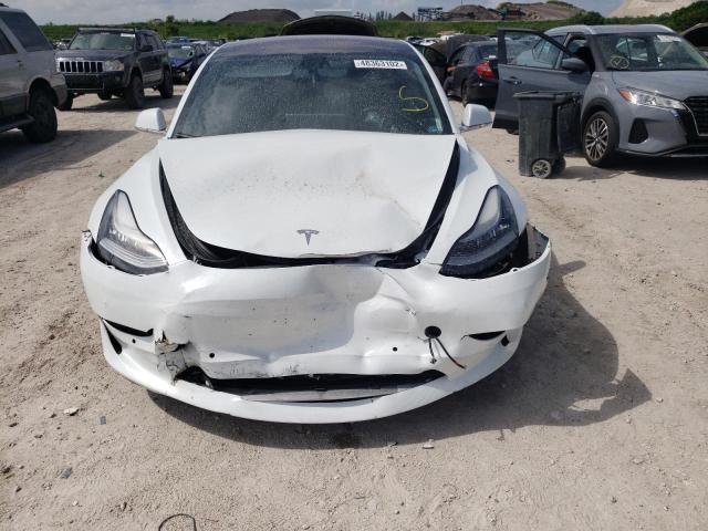 Photo 9 from auction – 2018 TESLA MODEL 3 with VIN 5YJ3E1EA9JF053983