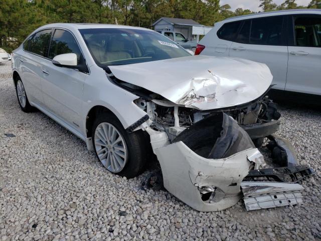 TOYOTA AVALON HYB 2014 with VIN 4T1BD1EBXEU034696 - Photo from auction