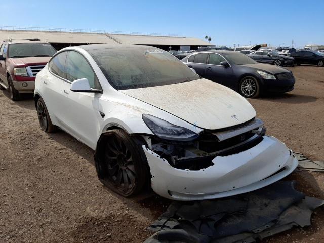 TESLA MODEL Y 2020 with VIN 5YJYGDEF2LF018556 - Photo from auction