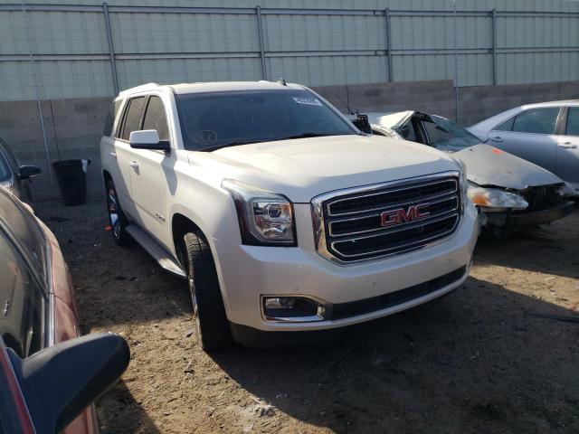 GMC YUKON SLT 2015 with VIN 1GKS2BKC9FR111886 - Photo from auction
