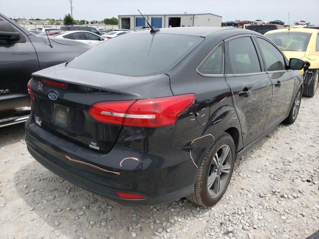Photo 4 from auction – 2017 FORD FOCUS SE with VIN 1FADP3FE8HL303173