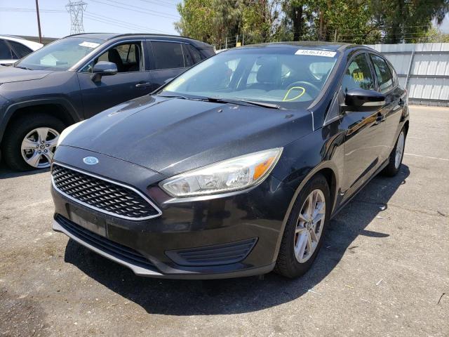 Photo 2 from auction – 2015 FORD FOCUS SE with VIN 1FADP3KE1FL261772