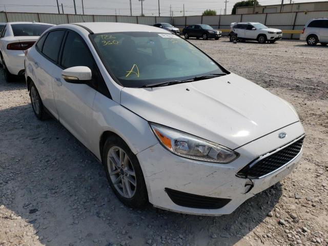 FORD FOCUS SE 2017 with VIN 1FADP3F28HL307536 - Photo from auction