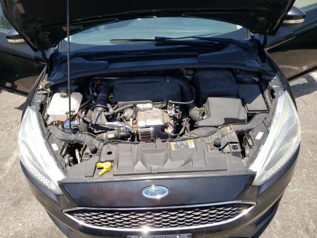 Foto 7 de la subasta – 2015 FORD FOCUS SE con VIN 1FADP3KE1FL261772