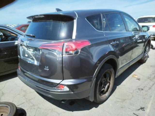 Photo 4 from auction – 2018 TOYOTA RAV4 LE with VIN JTMBFREV3JJ738077