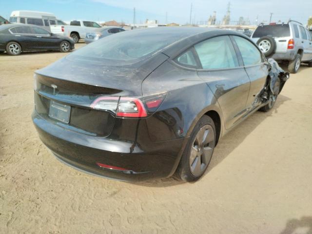 Photo 4 from auction – 2021 TESLA MODEL 3 with VIN 5YJ3E1EAXMF961637