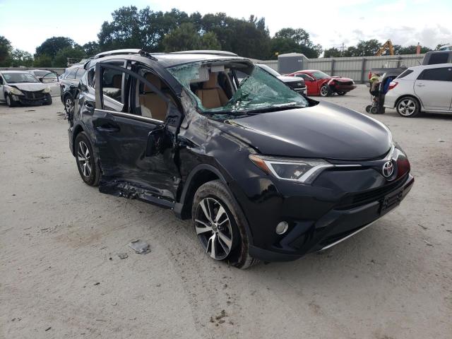 TOYOTA RAV4 XLE 2016 with VIN 2T3WFREV4GW245925 - Photo from auction
