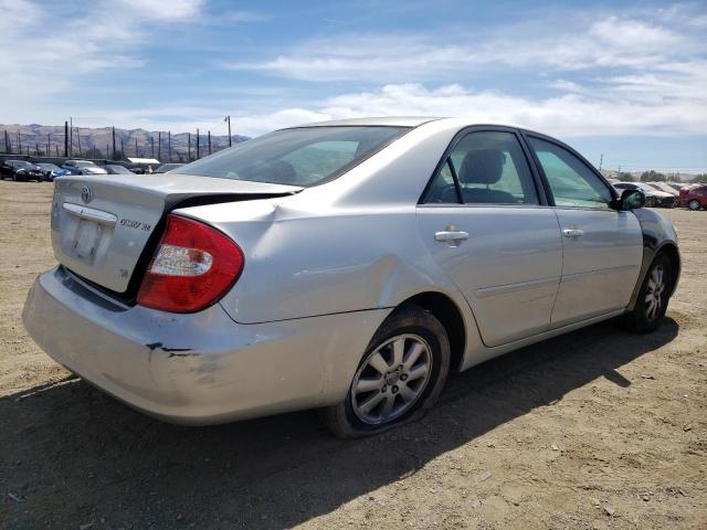 Photo 4 from auction – 2002 TOYOTA CAMARY with VIN JTDBF30K120078798
