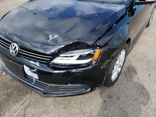 Photo 9 from auction – 2014 VOLKSWAGEN JETTA SE with VIN 3VWD17AJ7EM320271