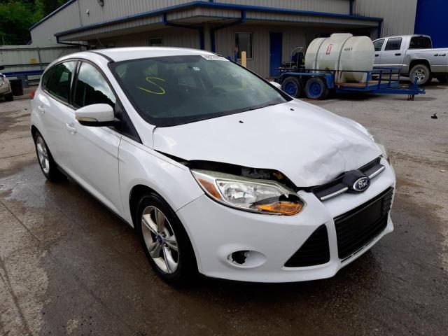 FORD FOCUS SE 2013 with VIN 1FADP3K21DL340555 - Photo from auction