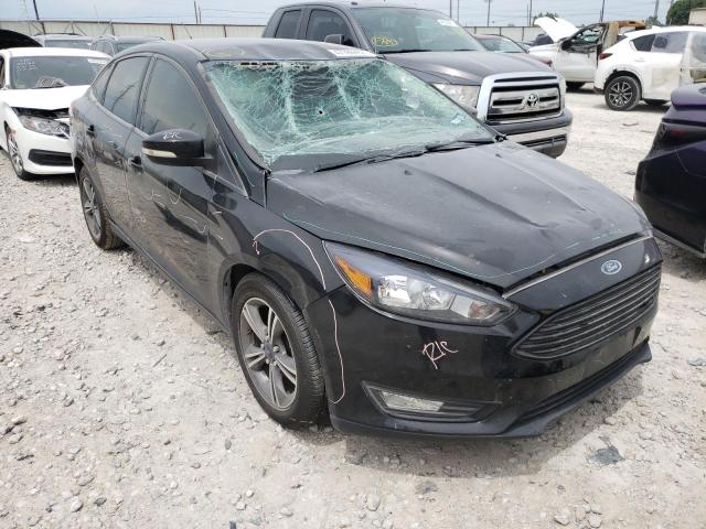 FORD FOCUS SE 2017 with VIN 1FADP3FE8HL303173 - Photo from auction