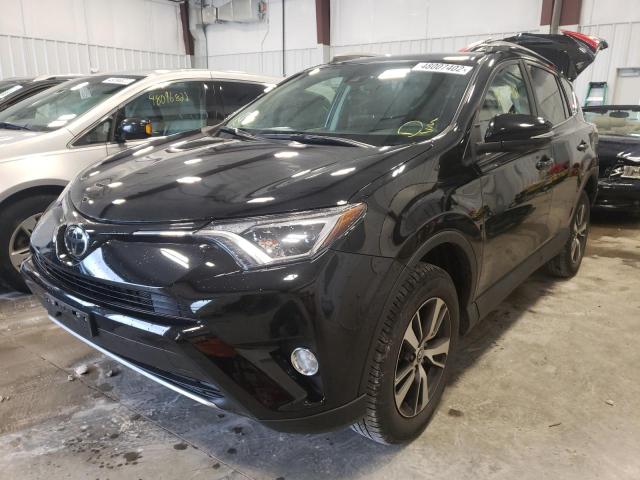 Photo 2 from auction – 2017 TOYOTA RAV4 XLE with VIN 2T3RFREV8HW651043