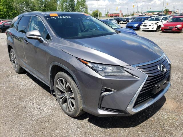 LEXUS RX 350 L 2019 with VIN JTJDZKCAXK2015066 - Photo from auction