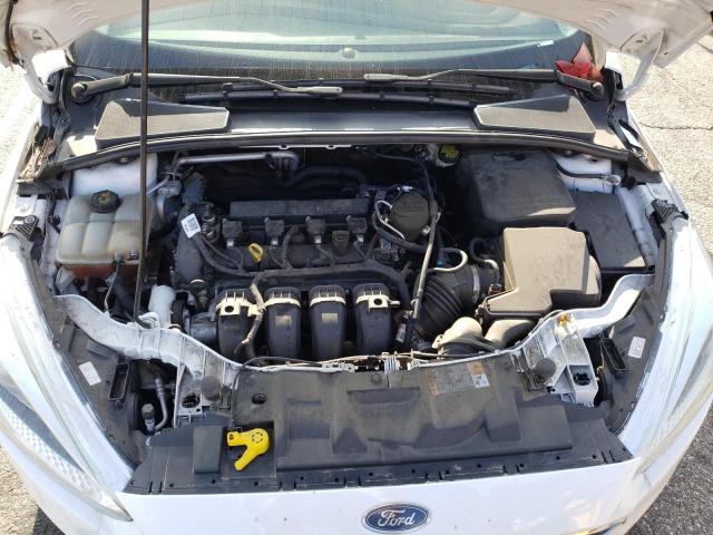 Photo 7 from auction – 2015 FORD FOCUS S with VIN 1FADP3E2XFL256183
