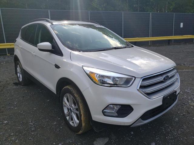 FORD ESCAPE SE 2018 with VIN 1FMCU9GD7JUC98549 - Photo from auction