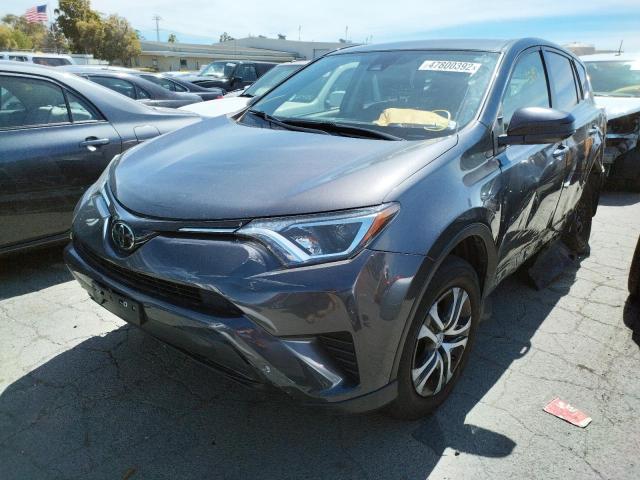 Photo 2 from auction – 2018 TOYOTA RAV4 LE with VIN JTMBFREV3JJ738077