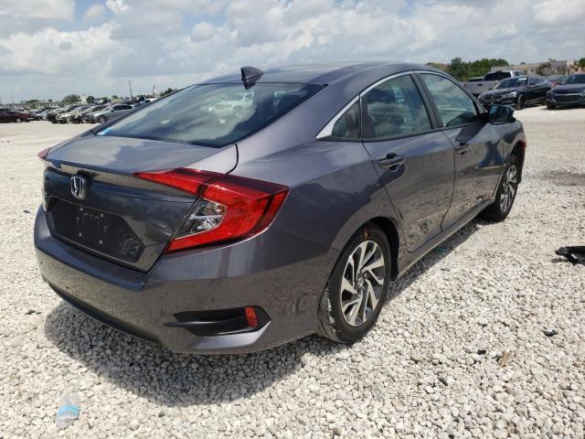 Photo 4 from auction – 2018 HONDA CIVIC EX with VIN 19XFC2F78JE036500