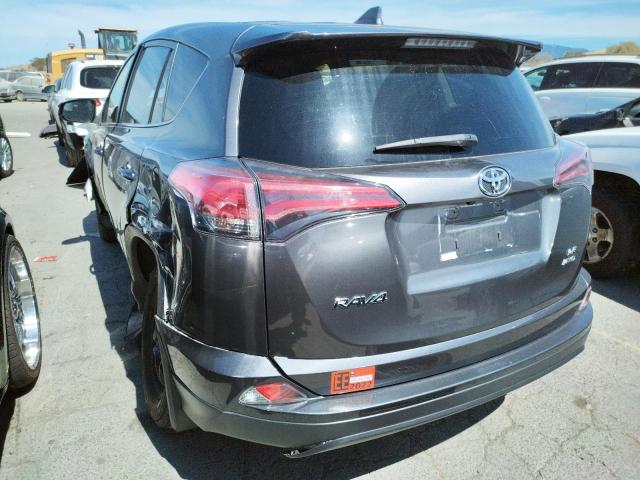 Photo 3 from auction – 2018 TOYOTA RAV4 LE with VIN JTMBFREV3JJ738077