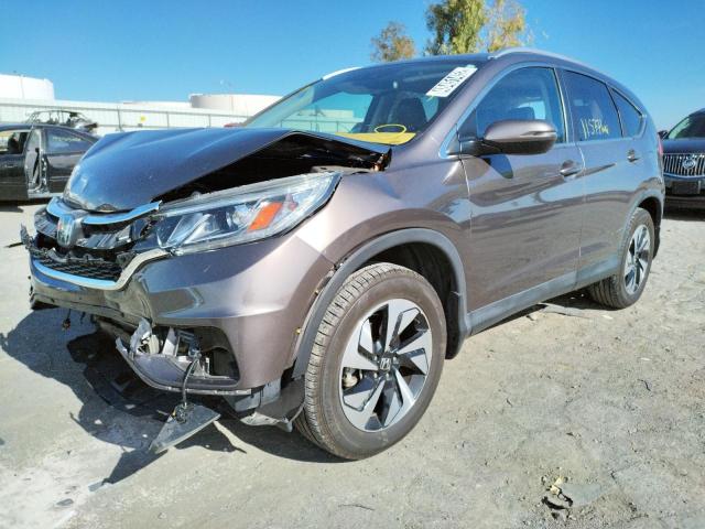 Photo 2 from auction – 2016 HONDA CR-V TOURI with VIN 5J6RM4H93GL113241