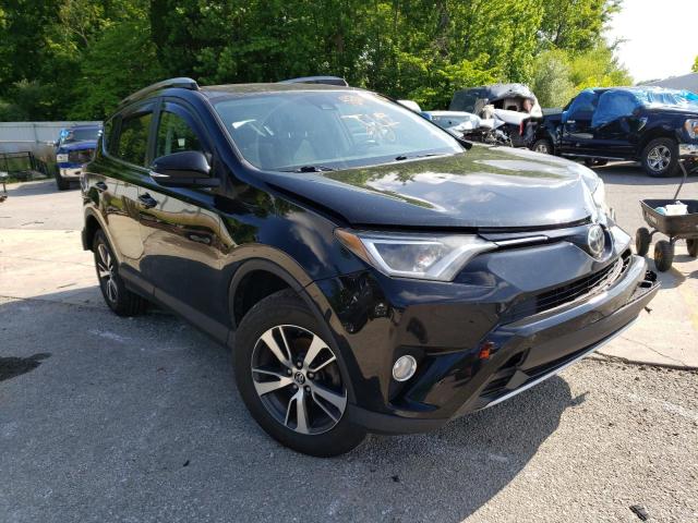 TOYOTA RAV4 XLE 2017 with VIN 2T3RFREV5HW611034 - Photo from auction