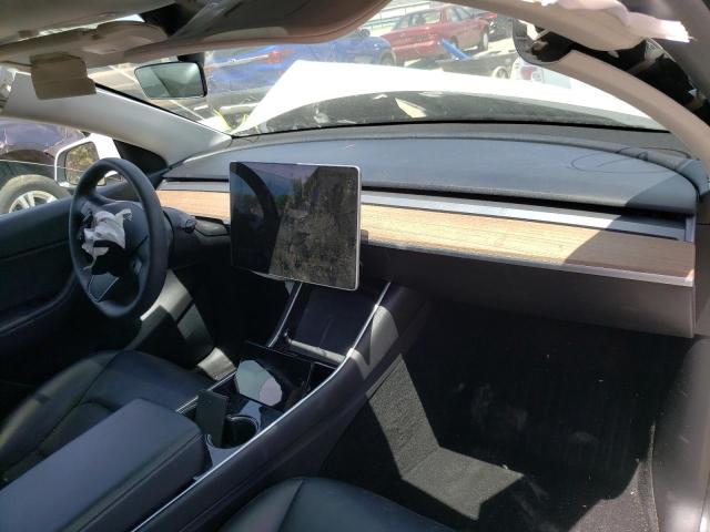 Photo 9 from auction – 2021 TESLA MODEL Y with VIN 5YJYGDEE4MF090660