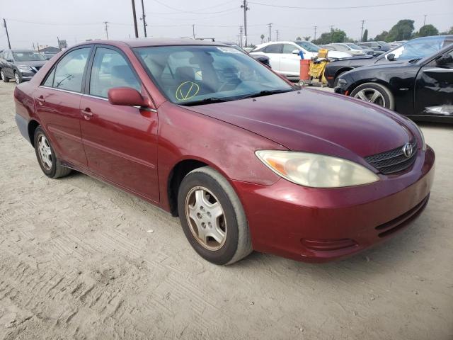 TOYOTA CAMRY LE 2002 with VIN 4T1BF32K52U017682 - Photo from auction