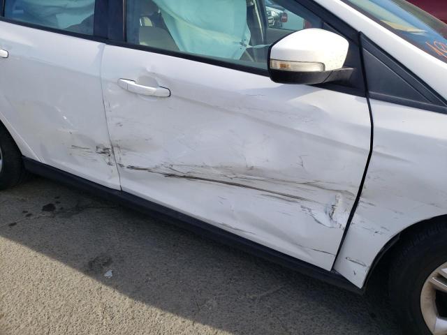 Photo 9 from auction – 2014 FORD FOCUS SE with VIN 1FADP3K29EL374714