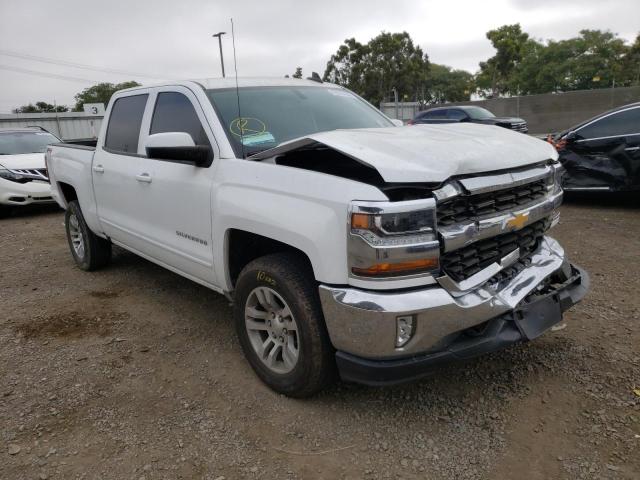 CHEVROLET SILVERADO 2018 with VIN 3GCUKREC9JG639607 - Photo from auction