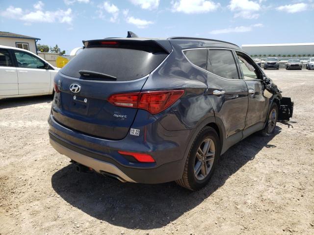 Photo 4 from auction – 2017 HYUNDAI SANTA FE S with VIN 5NMZU3LB5HH022677