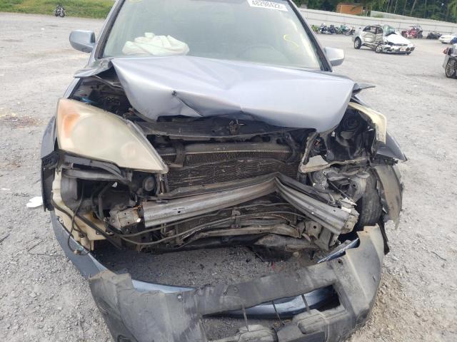 Photo 10 from auction – 2007 HONDA CRV with VIN JHLRE38777C026909