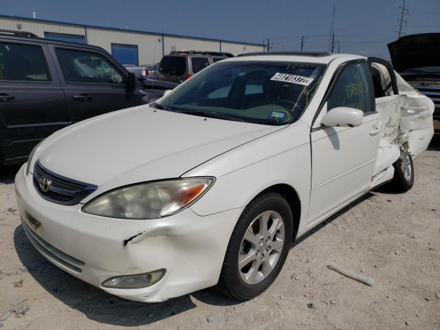 Photo 2 from auction – 2004 TOYOTA CAMRY LE with VIN JTDBE32K640284654