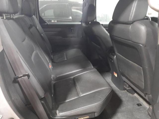 Photo 6 from auction – 2014 HONDA RIDGELINE with VIN 5FPYK1F64EB012991