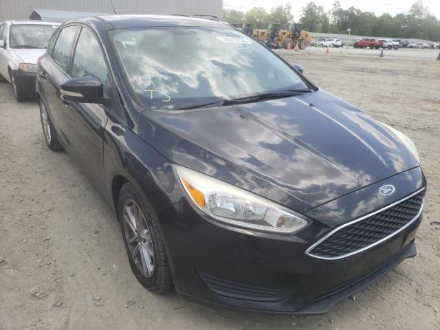 FORD FOCUS SE 2015 with VIN 1FADP3K22FL273077 - Photo from auction