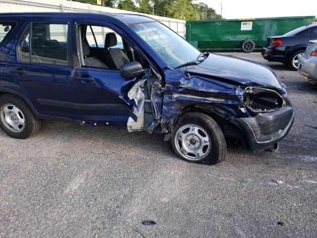 Photo 9 from auction – 2004 HONDA CR-V LX with VIN JHLRD68464C013851