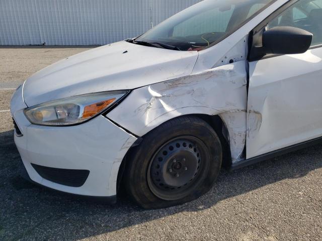 Photo 9 from auction – 2015 FORD FOCUS S with VIN 1FADP3E2XFL256183