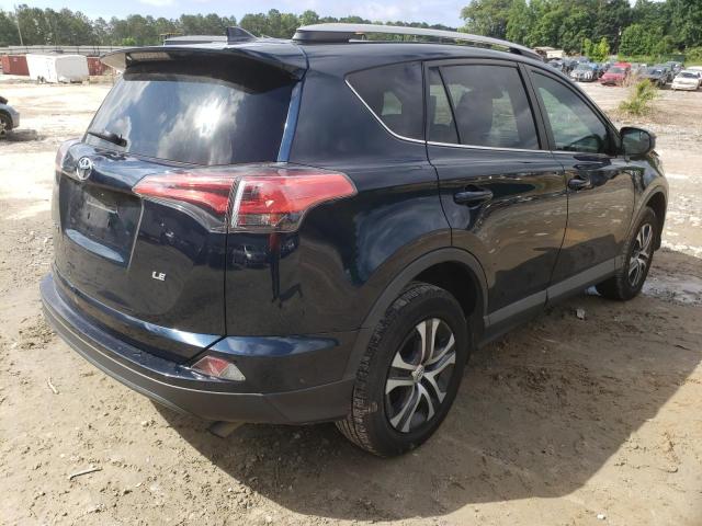 Photo 4 from auction – 2018 TOYOTA RAV4 LE with VIN 2T3ZFREV2JW463656