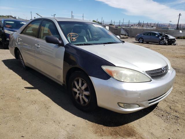 TOYOTA CAMARY 2002 with VIN JTDBF30K120078798 - Photo from auction