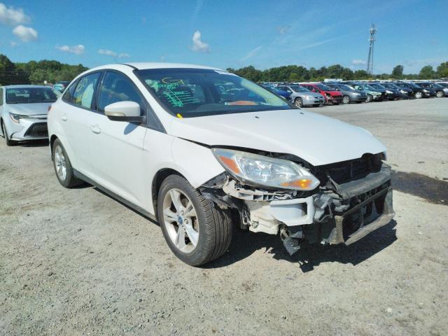 FORD FOCUS SE 2014 with VIN 1FADP3F20EL379021 - Photo from auction