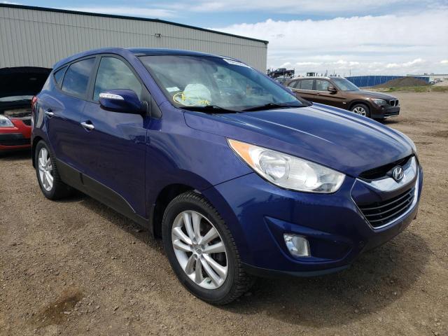 HYUNDAI TUCSON GLS 2011 with VIN KM8JUCAC1BU224579 - Photo from auction