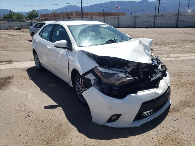 TOYOTA COROLLA L 2014 with VIN 5YFBURHE2EP119148 - Photo from auction
